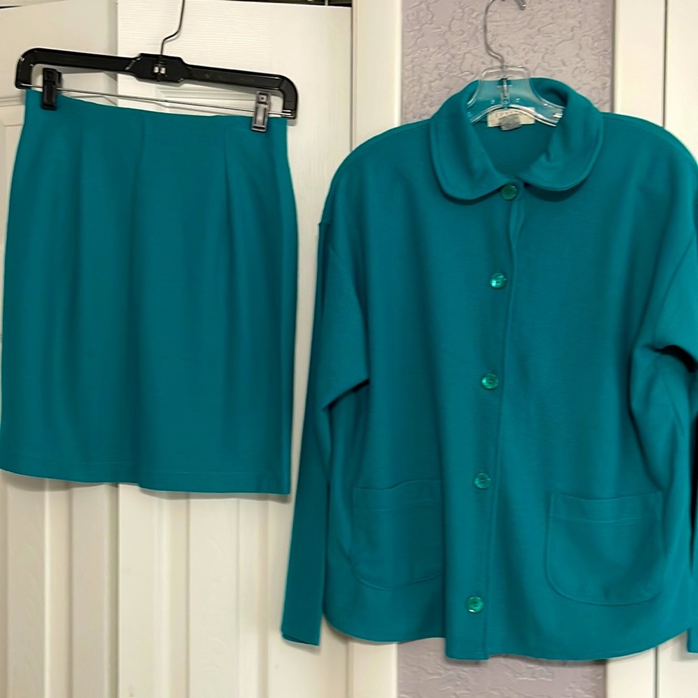 Express 2 piece knitwear suit. Juniors size M. Pretty Teal color. Never worn.